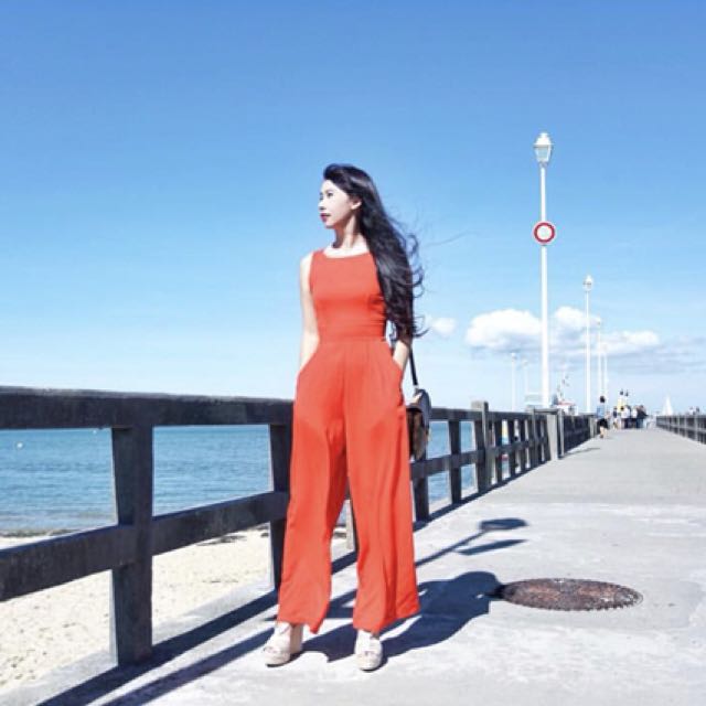 bright red jumpsuit
