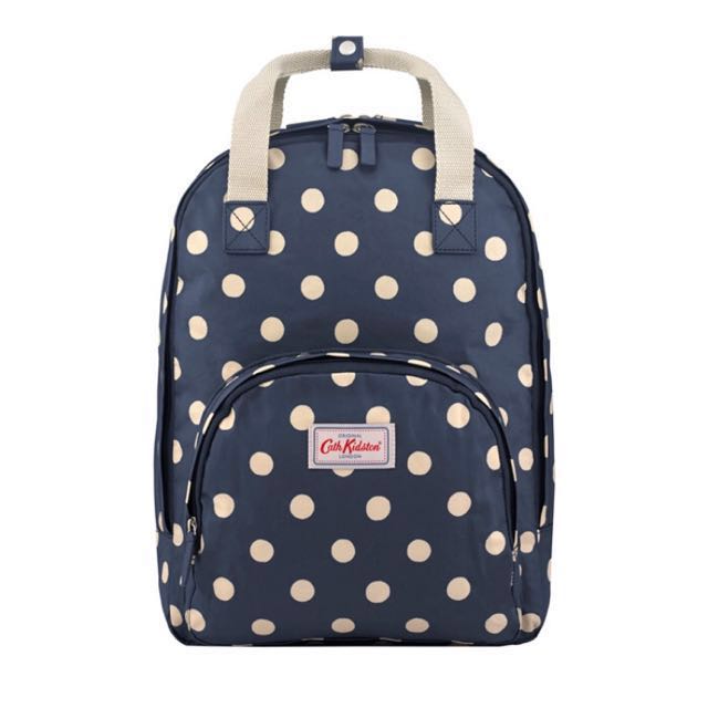 button spot multi pocket backpack