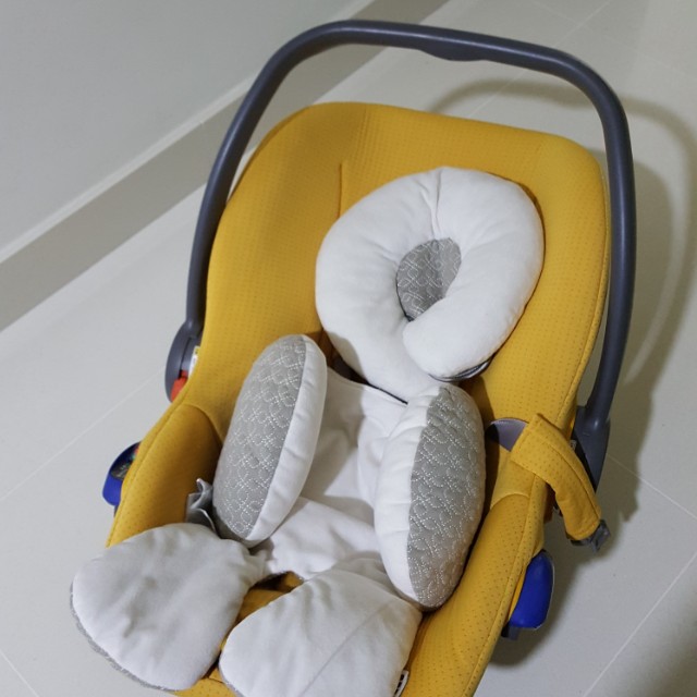 Combi Baby Car Seat With Infant Insert Accessories On
