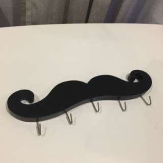 Moustache hooks