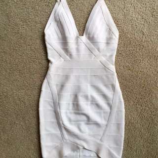 White bodycon dress Herve Leger style.