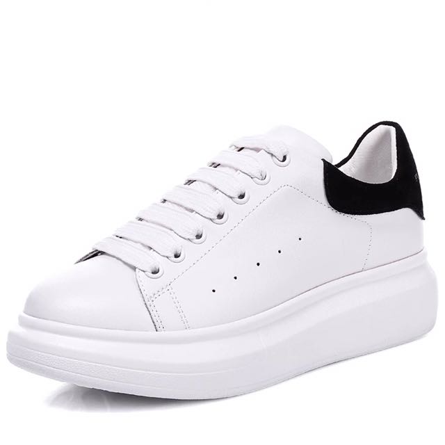 white shoes with black back