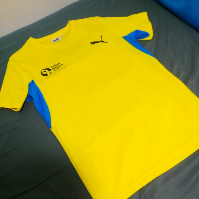 yellow running shirt