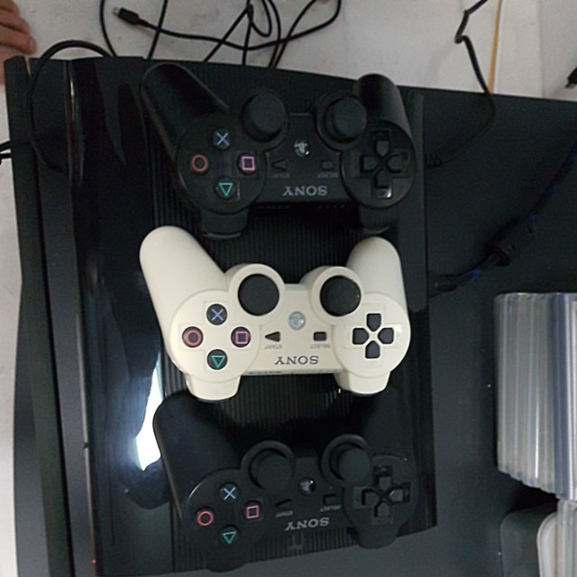 Ps3 (Category: PlayStation) located in Singapore. Submitted by royce.lim.9231 (Listing ID 142802243, Image 2). Description: Selling Ps3 with 3 controllers and some games. Condition: hardly used. Almost brand new. Price non-negotiable..