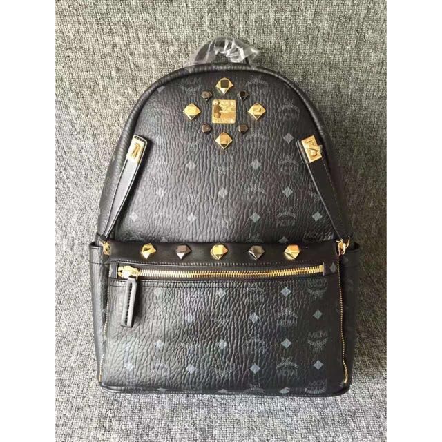 100 authentic MCM dual stark small backpack with dust bag Identity card warranty card and whole official package. Luxury Bags Wallets on Carousell
