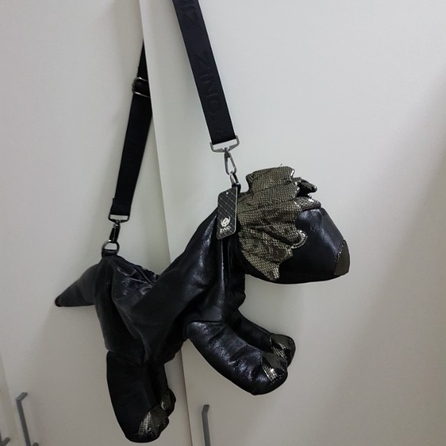 dinosaur sling bag