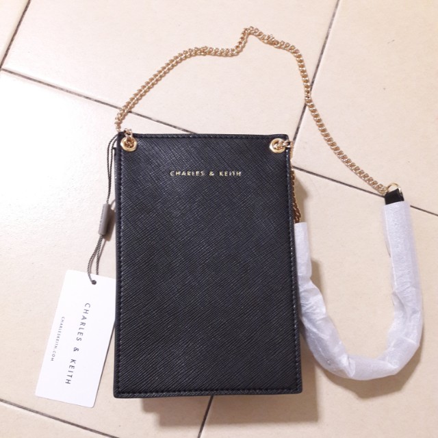 charles and keith pouch price