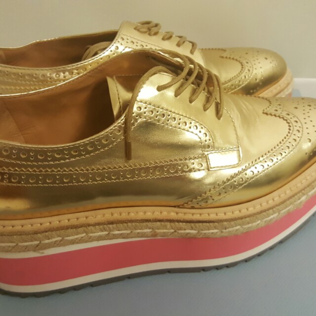 gold prada sneakers