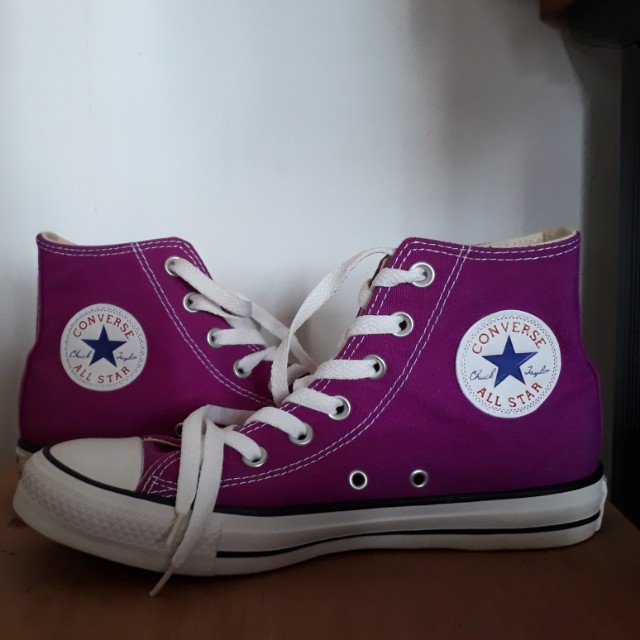 Purple converse high tops top