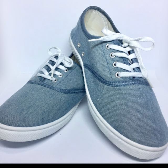 blue and white canvas shoes