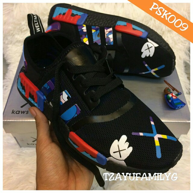 Nmd kaws hotsell
