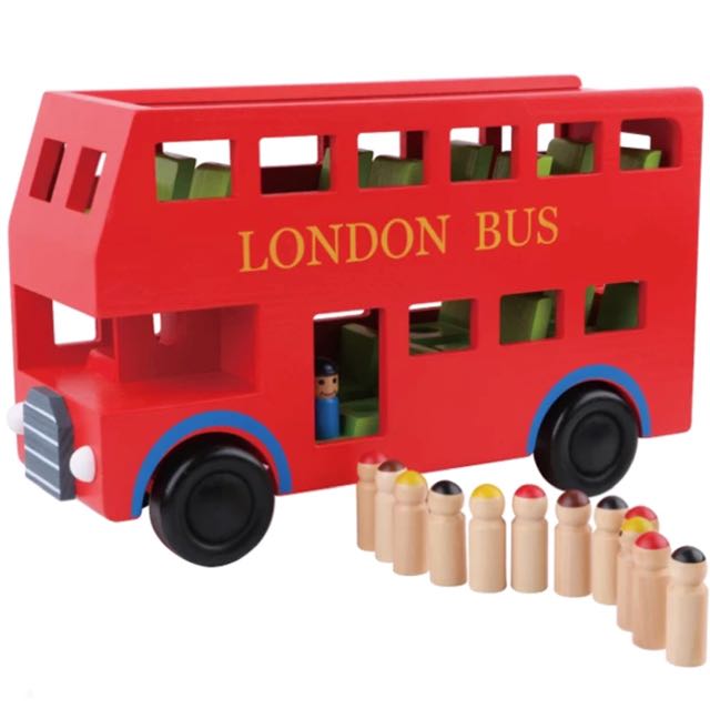 wooden london bus with passengers
