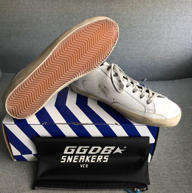 Golden goose superstar distressed best sale leather and suede sneakers