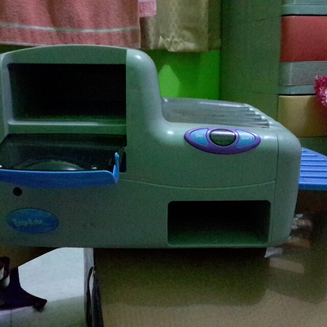 Easy Bake Real Oven Brand New (Category: Infant Playtime) located in Malabon City. Submitted by nicolea_ (Listing ID 143991989, Image 2). Description: Easy Bake Real Oven Brand New but box worned out With complete meal packets but this is from the 1990s/2000s ⚠️⚠️⚠️ please do not consume (mac and cheese, choco chip cookies, soft pretzels)| Set includes: REAL MEAL Oven 1 packet of macaroni 1 cheese powder mix 1 choco chip cookie mix 1 pretzel mix 