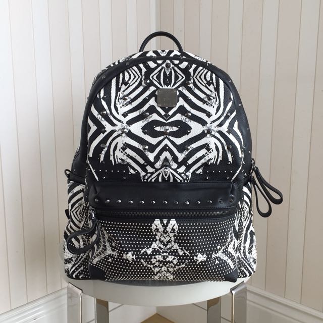 Mcm black on sale and white backpack