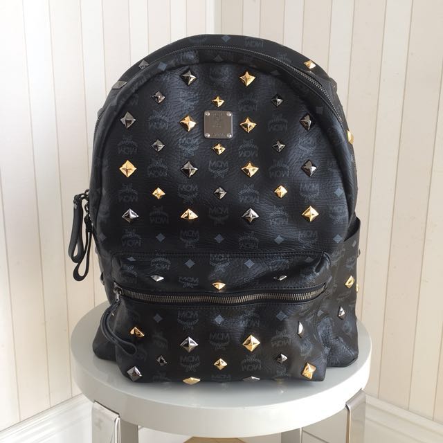 black and gold mcm bag