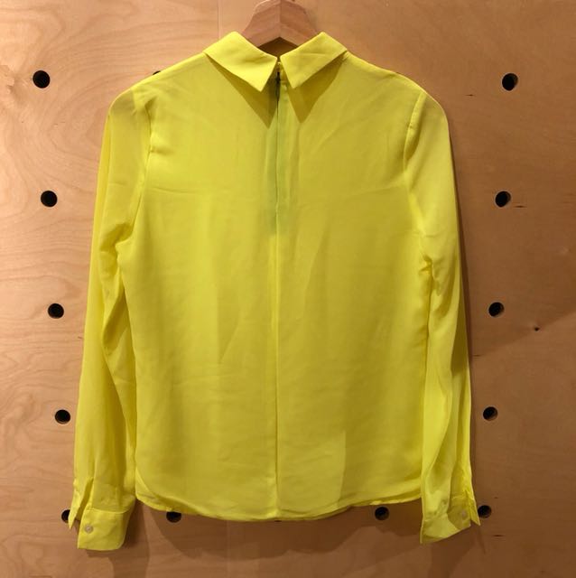 neon yellow blouse