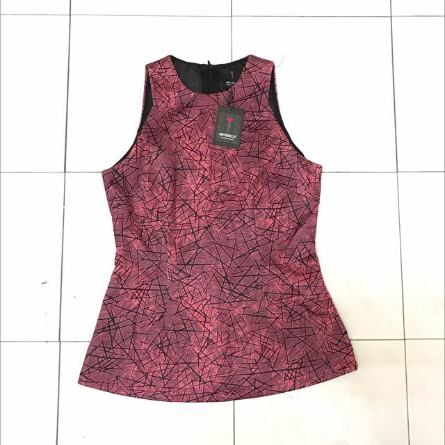 Premium quality Geometry Patterned Top (Category: Blouses) located in Jasin. Submitted by merry_lily (Listing ID 91774713, Image 1). Description: Size: M Brand: Dressabelle Premium quality Lay flat measurements: Shoulder 23cm Chest 41cm Waist 37cm Length 61cm.
