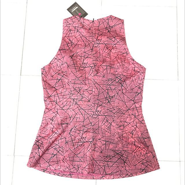 Premium quality Geometry Patterned Top (Category: Blouses) located in Jasin. Submitted by merry_lily (Listing ID 91774713, Image 2). Description: Size: M Brand: Dressabelle Premium quality Lay flat measurements: Shoulder 23cm Chest 41cm Waist 37cm Length 61cm.