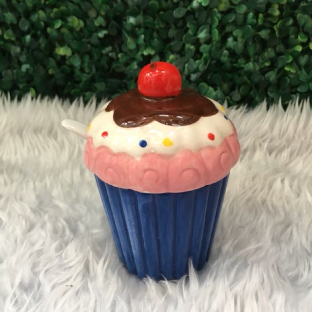Cupcake Ceramic Condiments Container (Category: Food Organization & Storage) located in Taguig. Submitted by behonestdear (Listing ID 144542529, Image 1). Description: Ceramic Material Super nice in actual! With box With teaspoon included.