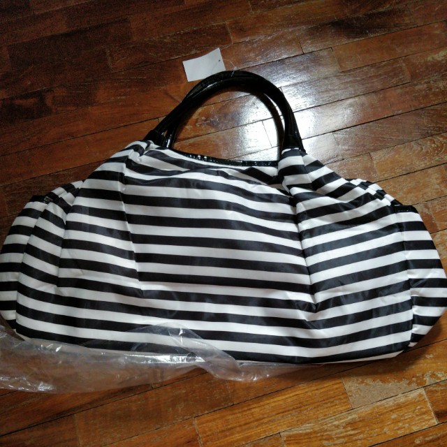 black and white striped luggage