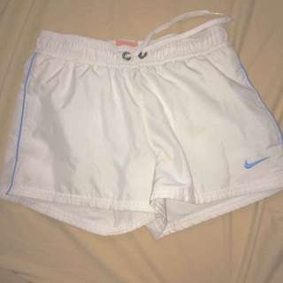 White Nike shorts