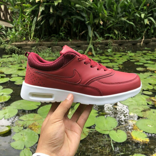 Nike thea maroon store