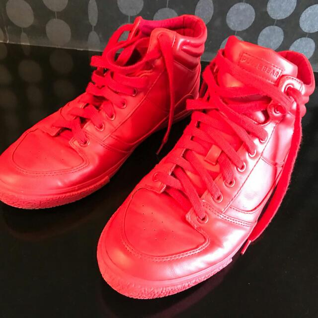 Red high top trainers best sale