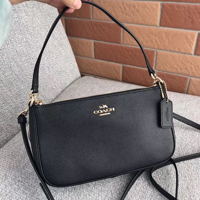 coach 2 way sling bag
