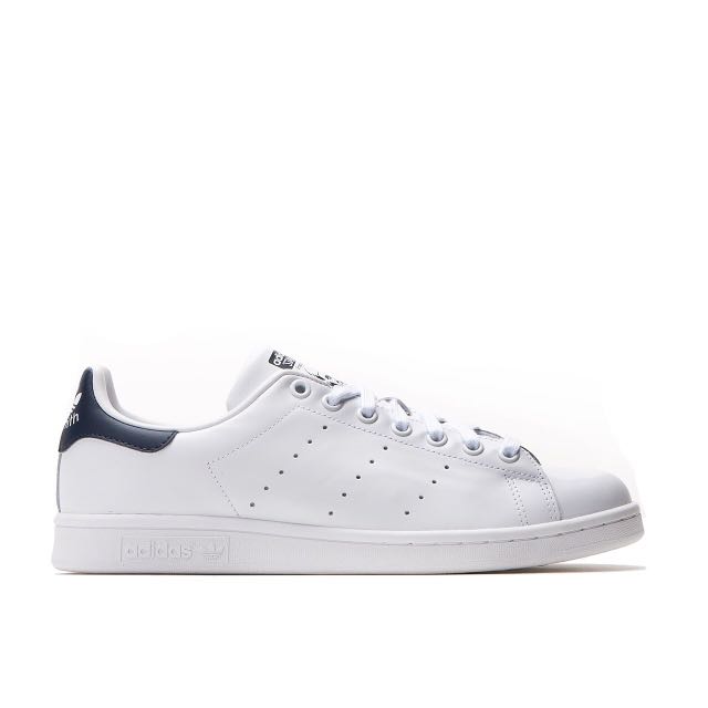 white and navy blue stan smiths