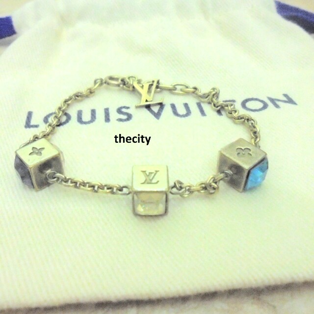 AUTHENTIC LOUIS VUITTON CRYSTAL GAMBLE BRACELET , IN GOLDTONE METAL,  Luxury, Accessories on Carousell