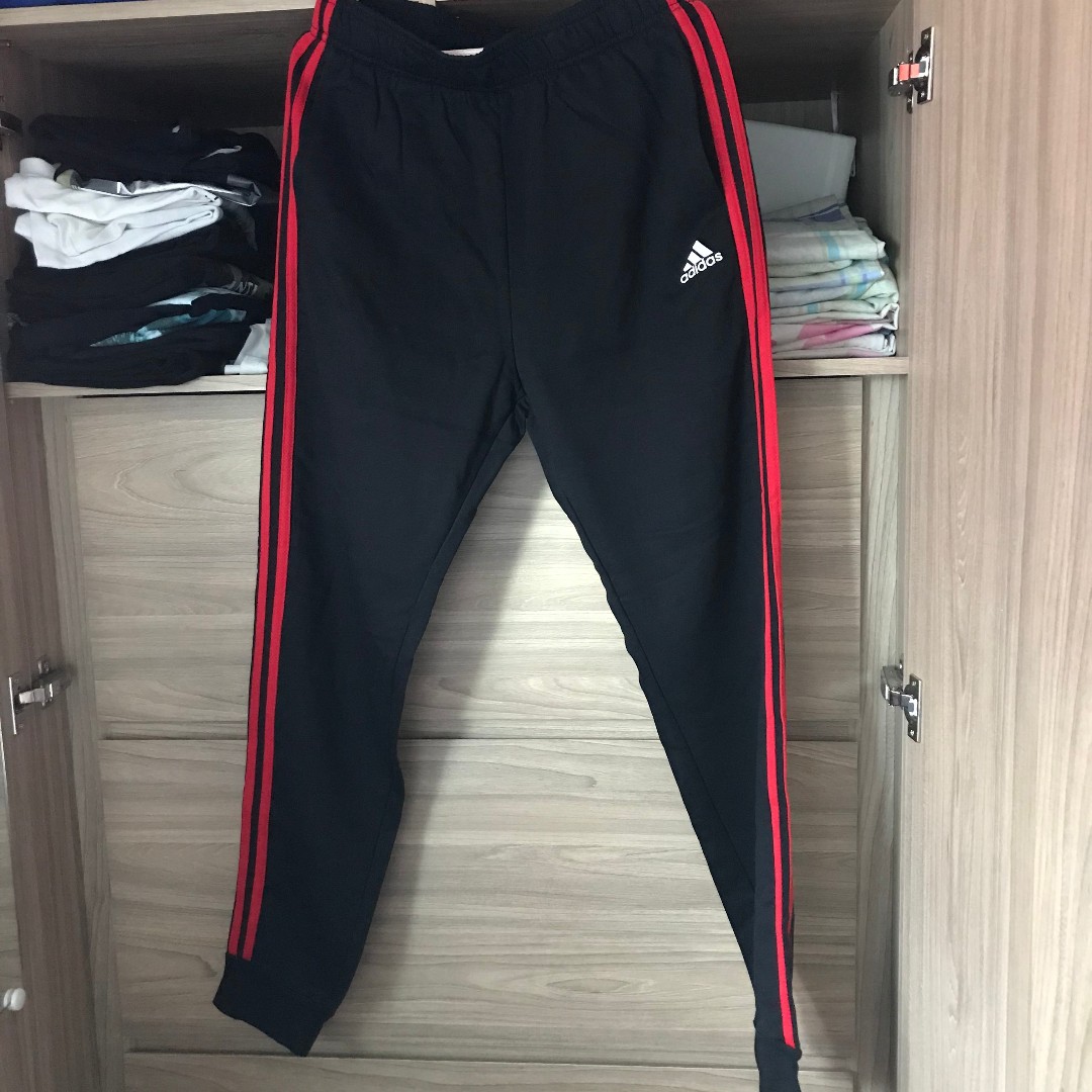 red adidas track pants outfit