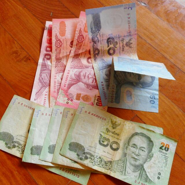 thailand thai baht currency notes and coins 1000 baht