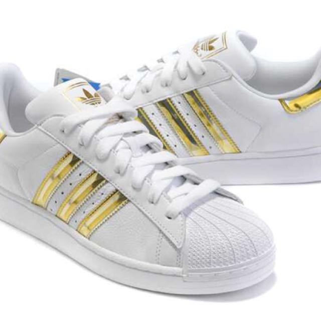 adidas superstar gold stripe