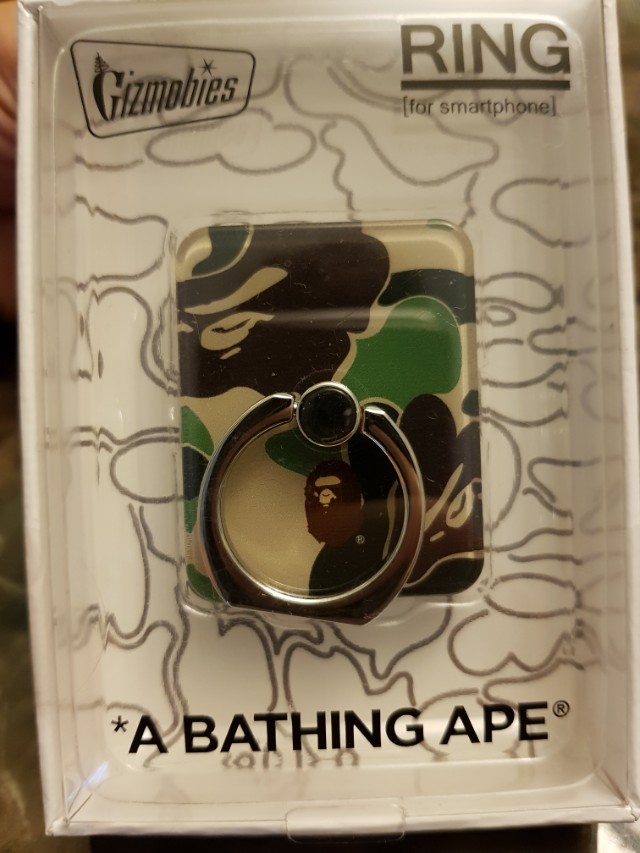 *A Bathing Ape (Category: Accessories) located in Singapore. Submitted by farhanaaliyy (Listing ID 146572221, Image 1). Description: Brand new in box *A Bathing Ape ring for smartphone. Bought in tokyo on december..