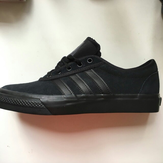 black adidas high top shoes