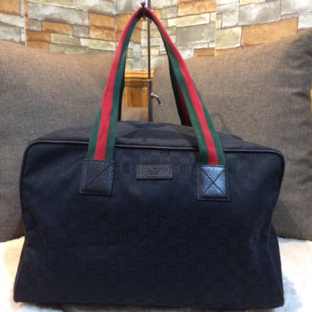 Gucci canvas travel bag on sale