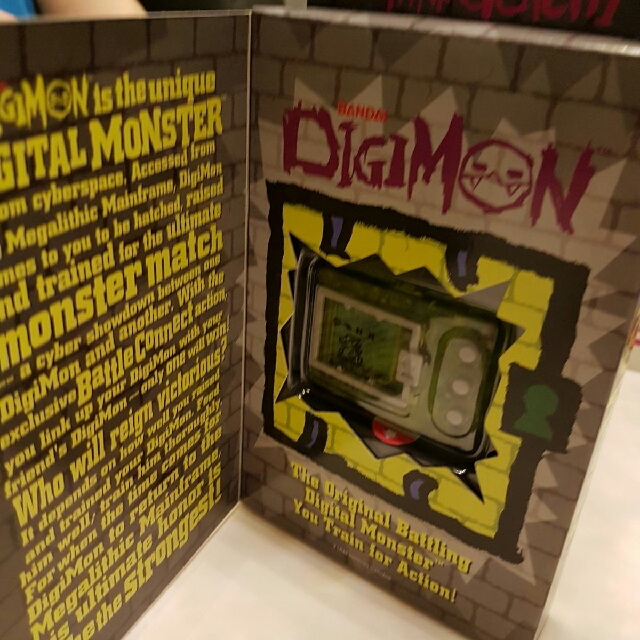 digimon version 1 (Category: Interactive Toys) located in Singapore. Submitted by ben_xio (Listing ID 146831713, Image 4). Description: tip top new sparkling ver 1997 english USa/europe version twin pair transparent swee! near extinction~ 2 for 400.