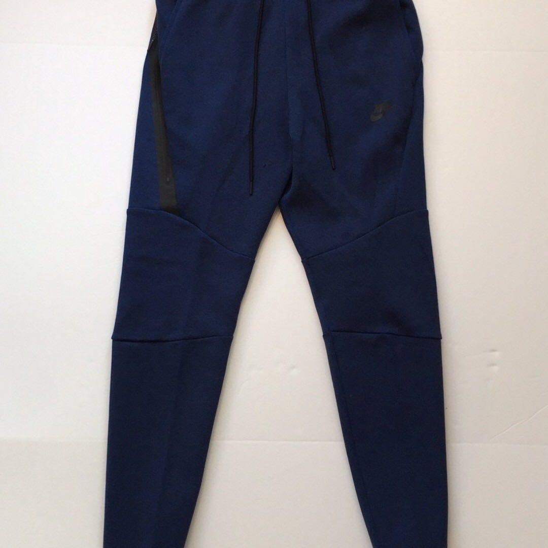 navy blue nike tech pants