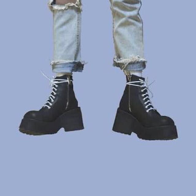 black boots white shoelaces
