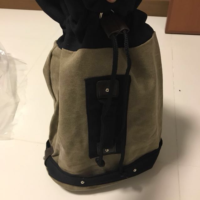 Drawstring Backpack (Category: Backpacks) located in Singapore. Submitted by johnnyboy123 (Listing ID 147430943, Image 2). Description: Great for casual use and can fit quite a lot of things . Strap can be zipped to become one strap or two strap .