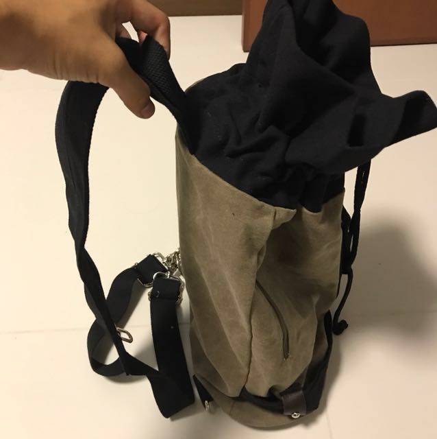Drawstring Backpack (Category: Backpacks) located in Singapore. Submitted by johnnyboy123 (Listing ID 147430943, Image 3). Description: Great for casual use and can fit quite a lot of things . Strap can be zipped to become one strap or two strap .