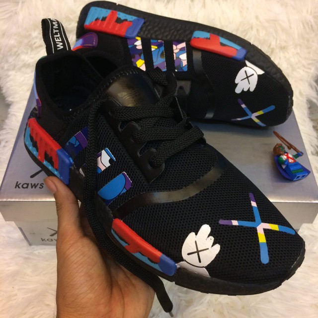 Kaws nmd deals