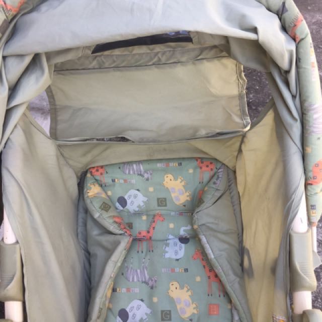 Graco Green stroller. In good condition but with wear on handle and ...