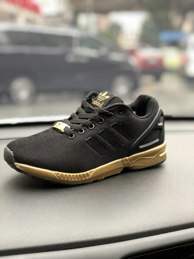 zx flux gold prezzo