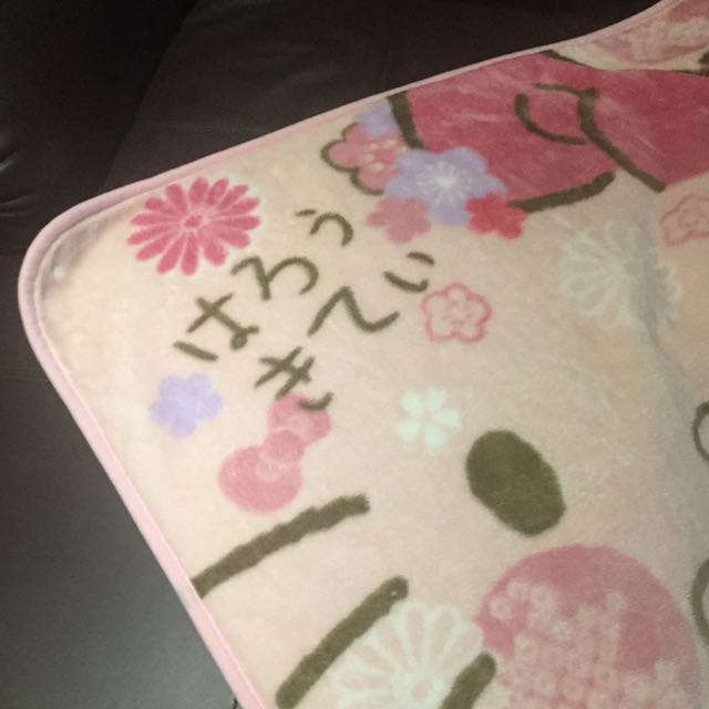 Sanrio Blanket (Category: Accessories) located in Toronto. Submitted by komo.rebi (Listing ID 148968709, Image 3). Description: Super cute Hello Kitty blanket! This is a real Sanrio blanket that can be buttoned around your neck to keep you warm. Great for lazing around! .