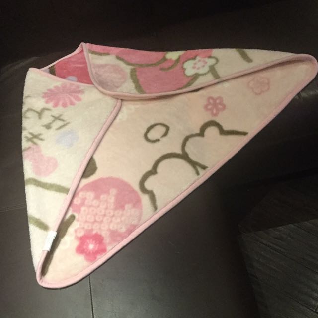 Sanrio Blanket (Category: Accessories) located in Toronto. Submitted by komo.rebi (Listing ID 148968709, Image 2). Description: Super cute Hello Kitty blanket! This is a real Sanrio blanket that can be buttoned around your neck to keep you warm. Great for lazing around! .