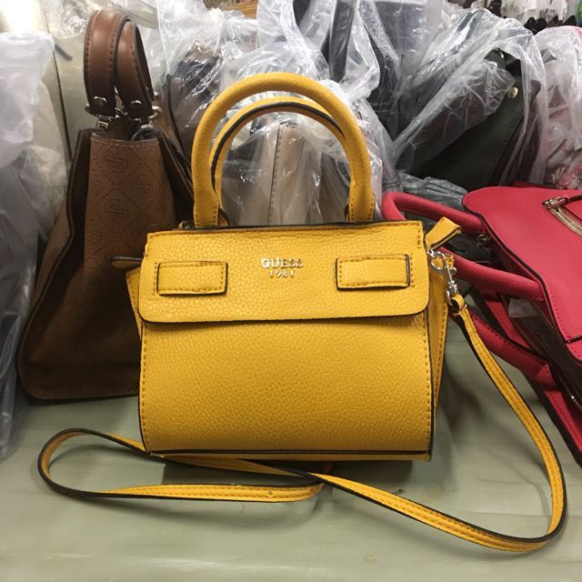 mustard guess handbag