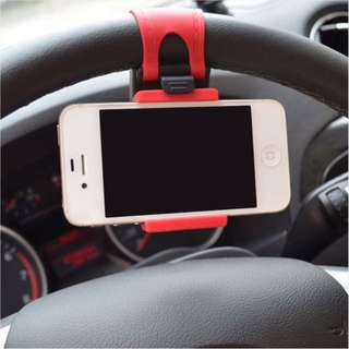 Cellphone holder on car steering wheel
