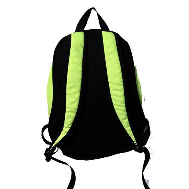 grey and green nike backpack